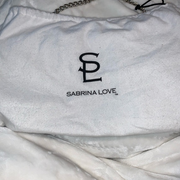 Sabrina Love black leather clutch